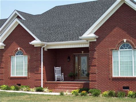 red brick house with pewter grey metal roof|red brick roof color chart.